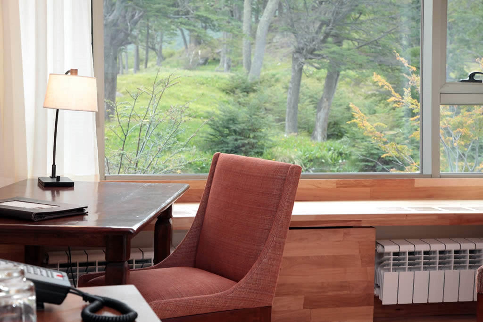 Arakur Ushuaia Resort & Spa Buitenkant foto A view of the woods from the library